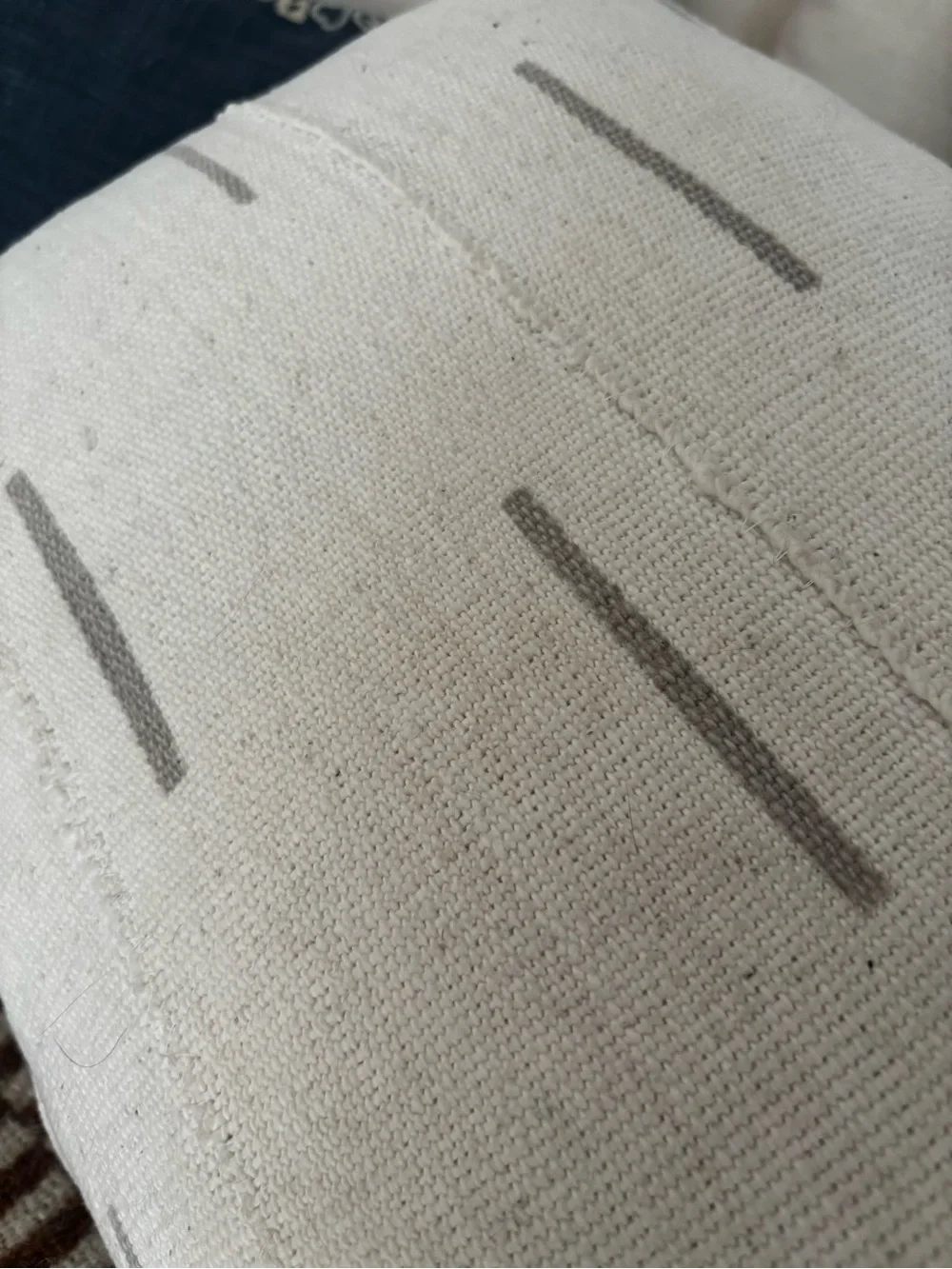 Cream Decorative Lumbar Pillow with Subtle Gray Stitching